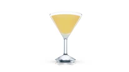 Almond’tini in a martini glass on white background