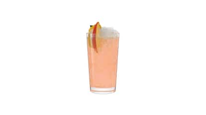 Apeach Temptation in a highball glass with crushed ice and peach slices on the rim