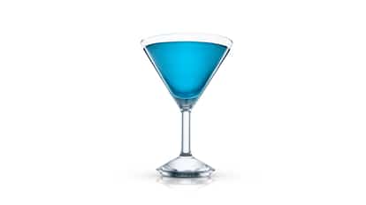 Blue Day in a martini glass on white background