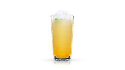Coleraine Cooler in a highball glass with crushed ice and a lime wedge on white background