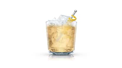 Donny in an Absolut rocks glass with crushed ice and lemon twist on a metal pick