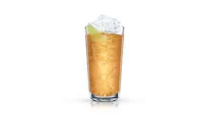 Fidel Castro in a highball glass with crushed ice and a lime wedge on white background