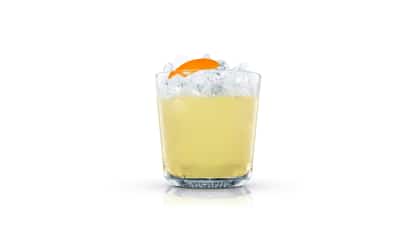 Flower Power Sour in an Absolut rocks glass with crushed ice and an orange peel on white background