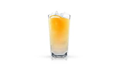 Golden Spike in a highball glass with ice and a citrus twist on white background
