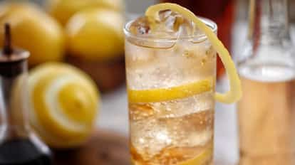 Horse’s Neck in a highball glass with a long lemon peel spiral and ice