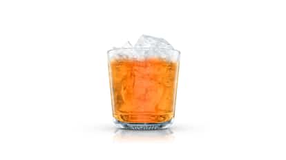 International Stinger in an Absolut rocks glass with ice on white background