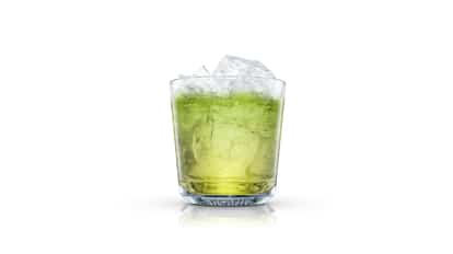 Jacqueline in an Absolut rocks glass with crushed ice on white background
