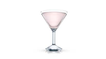 Pink martini in a stemmed cocktail glass, single serving on white background.