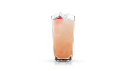 L.O Smith Punch in a highball glass with ice and a strawberry garnish on white background