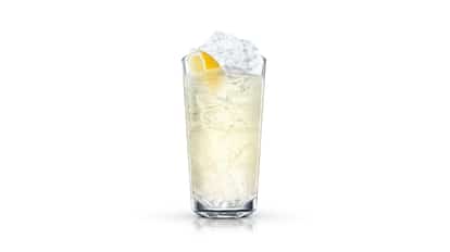 Lemongrad in a highball glass with ice and a lemon wedge on white background