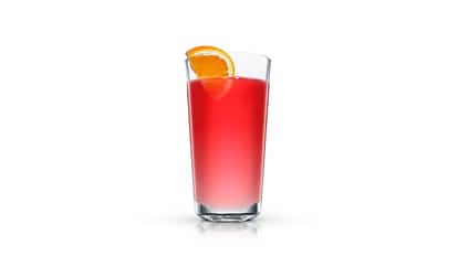 Red orange cocktail in a highball glass garnished with an orange slice on white background.