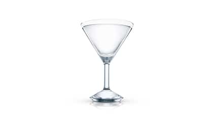 Martini served in an Absolut martini glass on white background