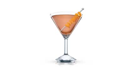 New Yorker in an Absolut martini glass with an orange twist on white background