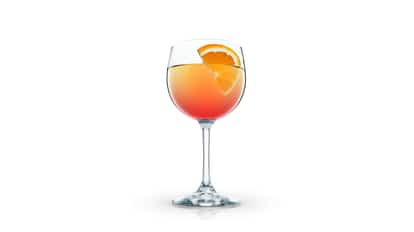 Orange Breeze in a wine glass with an orange slice on white background