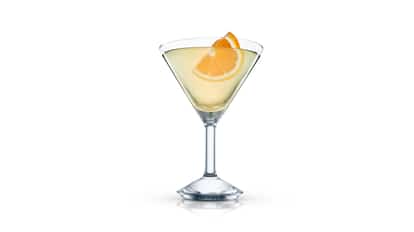 Raymond Hitch Cocktail in a martini glass with an orange slice on white background