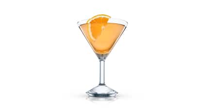 Soul Kiss in a stemmed martini glass with an orange slice on white background