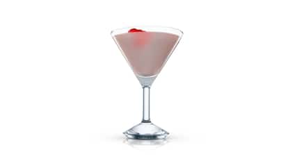 Thigh High in a martini glass with a strawberry resting on the surface on white background